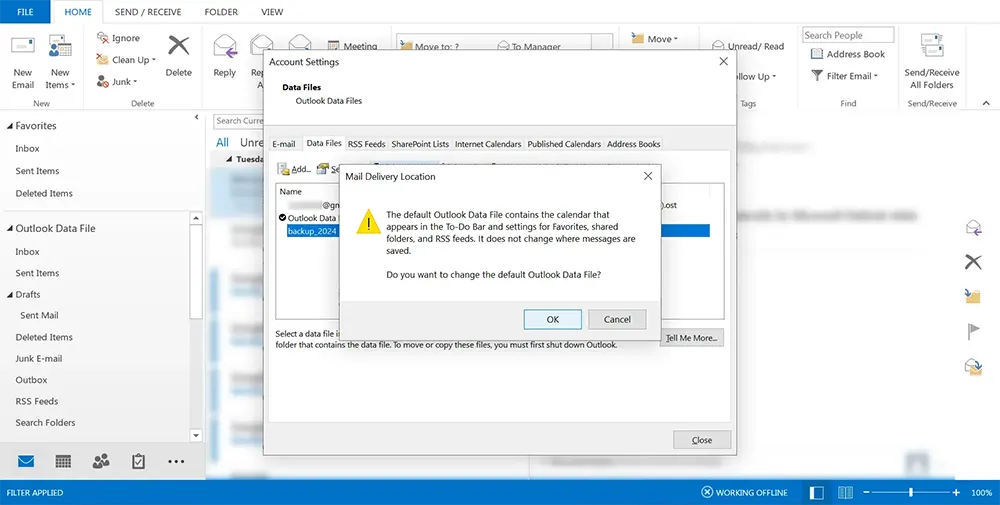 Confirming default data file change in Outlook.